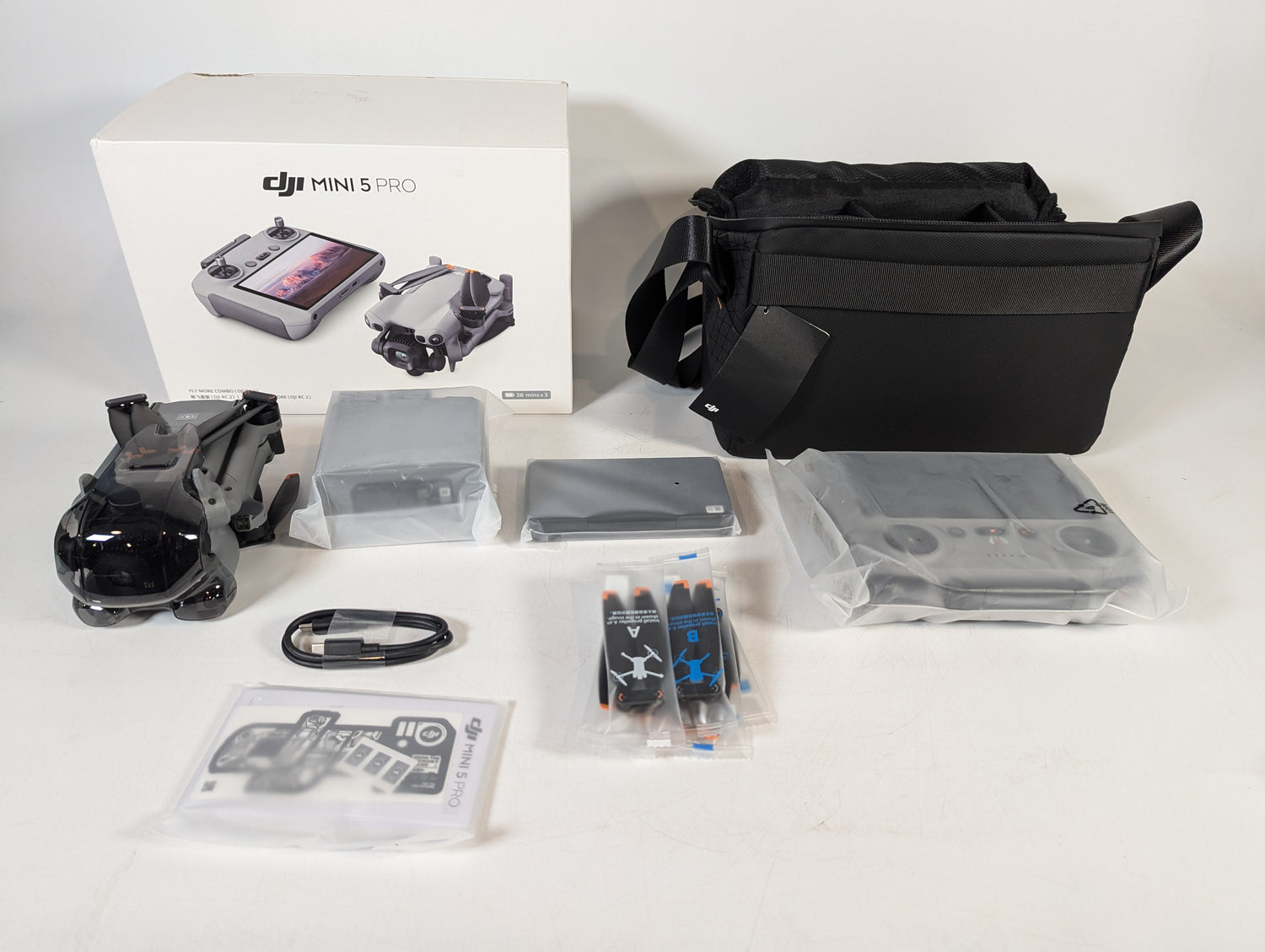 Brand New DJI Mini 5 Pro Fly More Combo with RC2 Remote